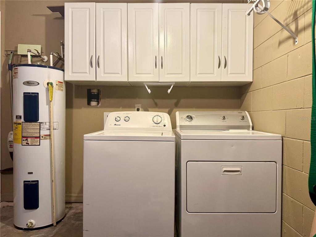 5169 Lazy Oaks Drive Winter Park, FL 32792 - Photo 20 of 25 a utility room with dryer and washer