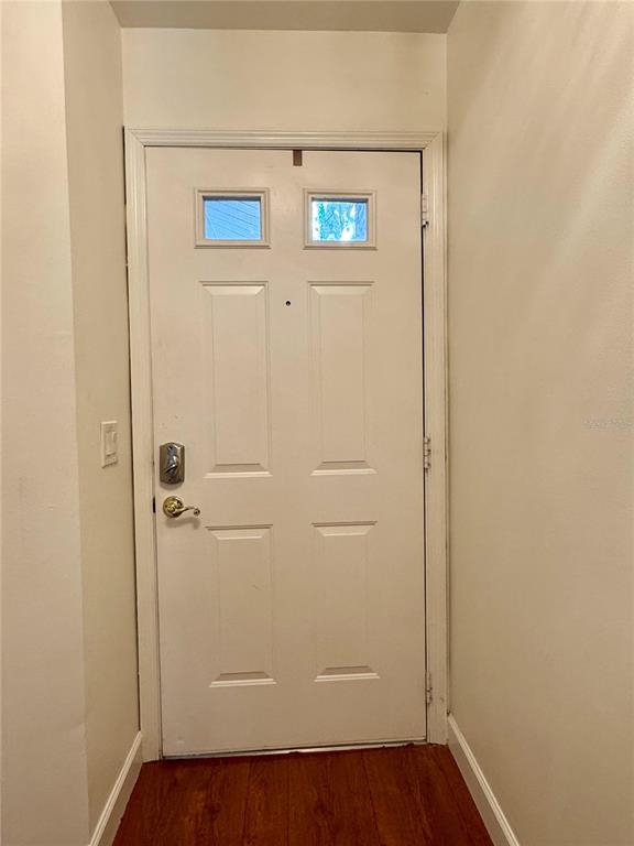 5169 Lazy Oaks Drive Winter Park, FL 32792 - Photo 2 of 25 an empty room with wooden floor