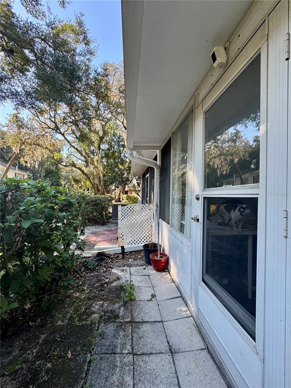 5169 Lazy Oaks Drive Winter Park, FL 32792 - Photo 22 of 25 a view of a entryway door of the house