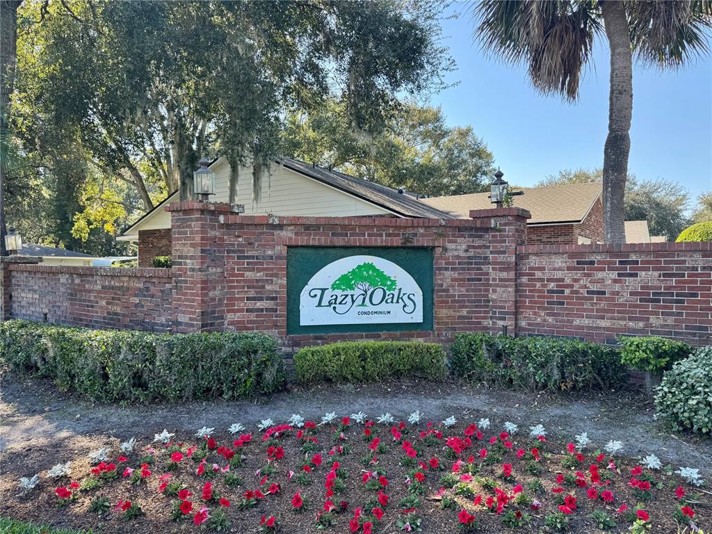 5169 Lazy Oaks Drive Winter Park, FL 32792 - Photo 24 of 25 a view of sign board with flower plants