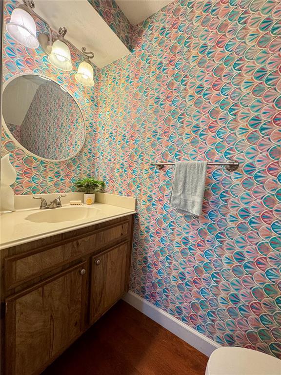 5169 Lazy Oaks Drive Winter Park, FL 32792 - Photo 4 of 25 a bathroom with a sink mirror and vanity