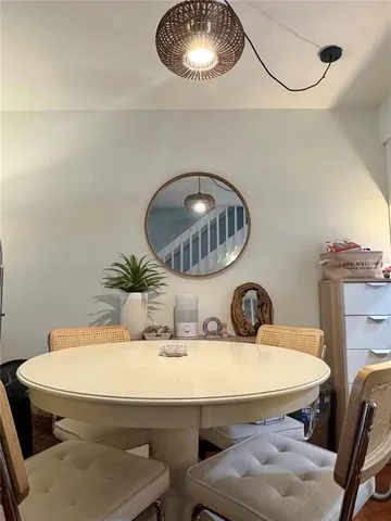 a bathroom with a sink a mirror and a toilet