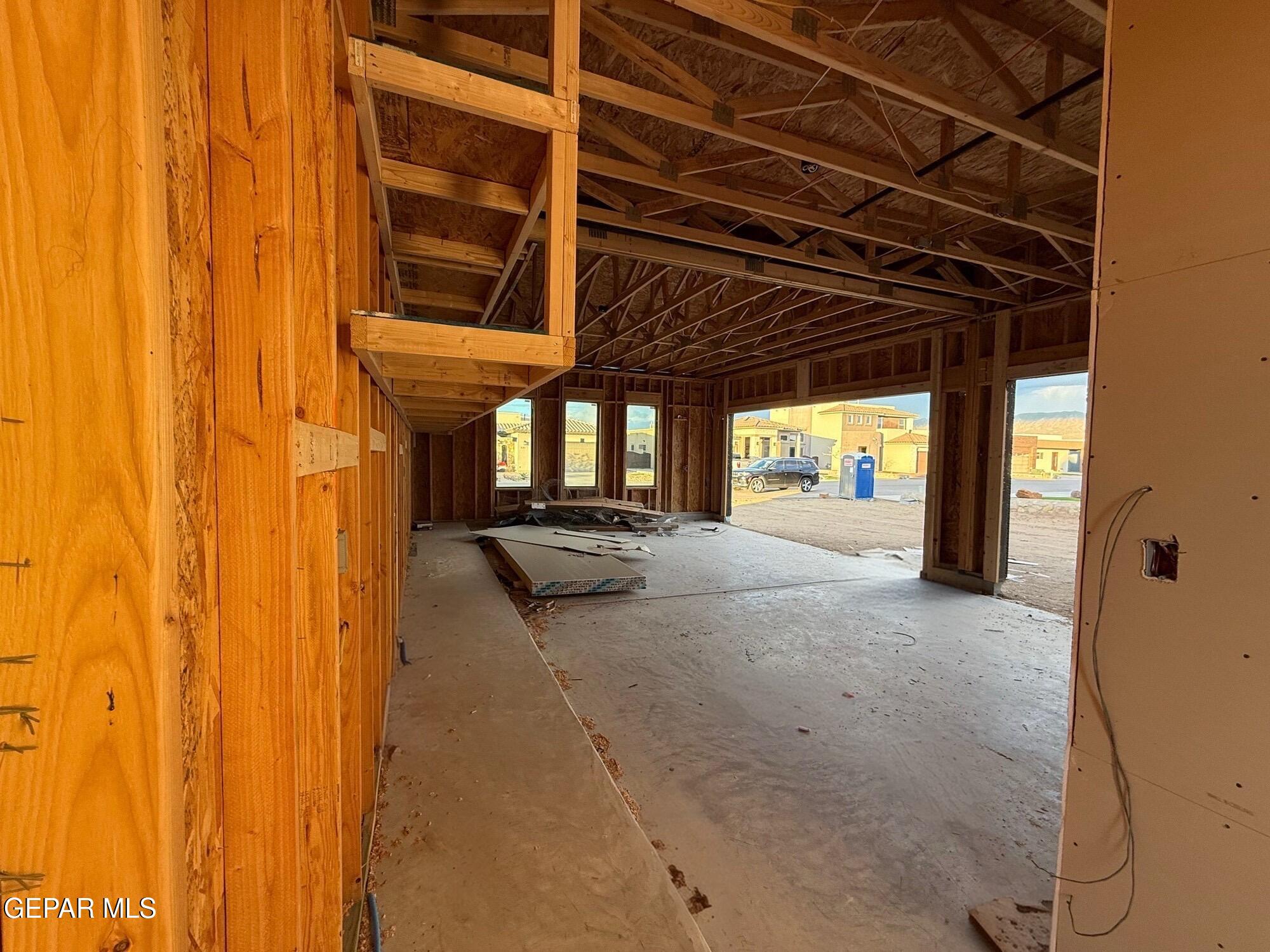 320 Rio Del Rancho Court El Paso, TX 79932 - Photo 22 of 25 a view of a room with wooden walls and windows