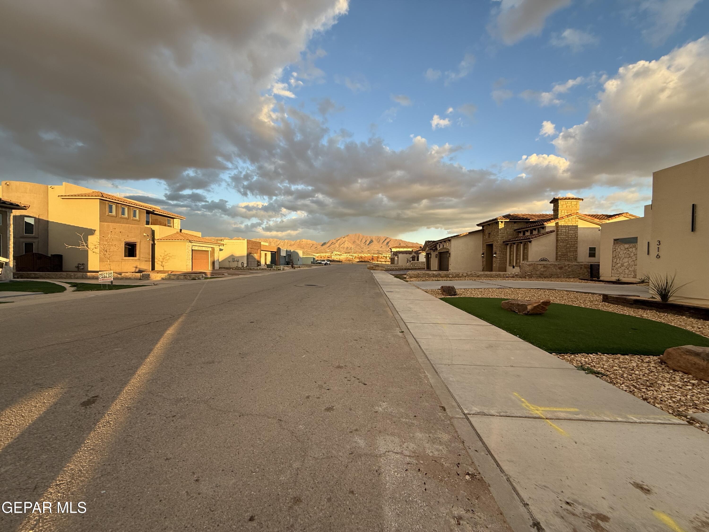 320 Rio Del Rancho Court El Paso, TX 79932 - Photo 24 of 25 a view of a street with cars
