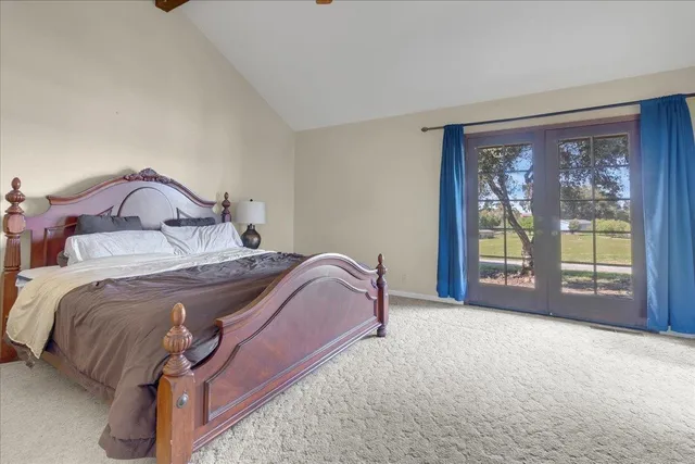 a spacious bathroom with a bathtub and a sink