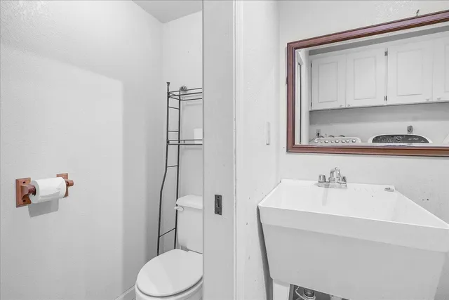 a view of balcony with wooden floor and outdoor seating