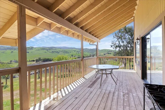 a view of a house with a yard and garage