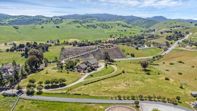 an aerial view of a house with a garden