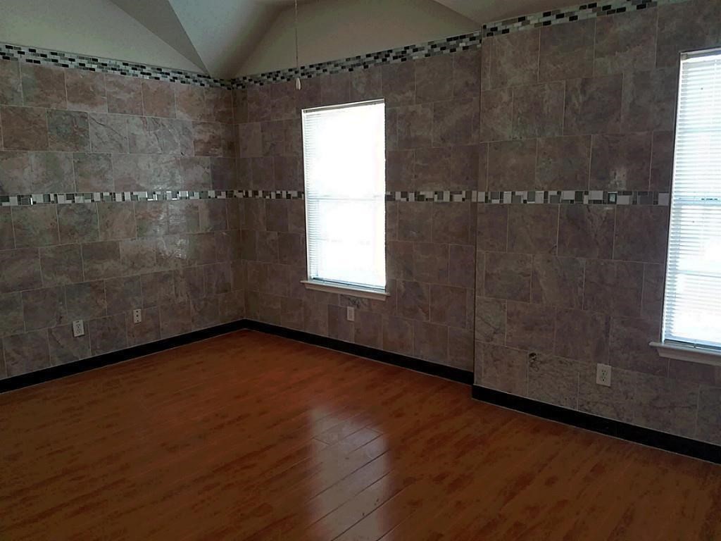 31 Verbena Bend Place Spring, TX 77382 - Photo 12 of 13 a view of a window in an empty room