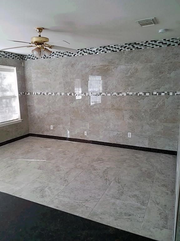 31 Verbena Bend Place Spring, TX 77382 - Photo 4 of 13 an empty room with wooden floor