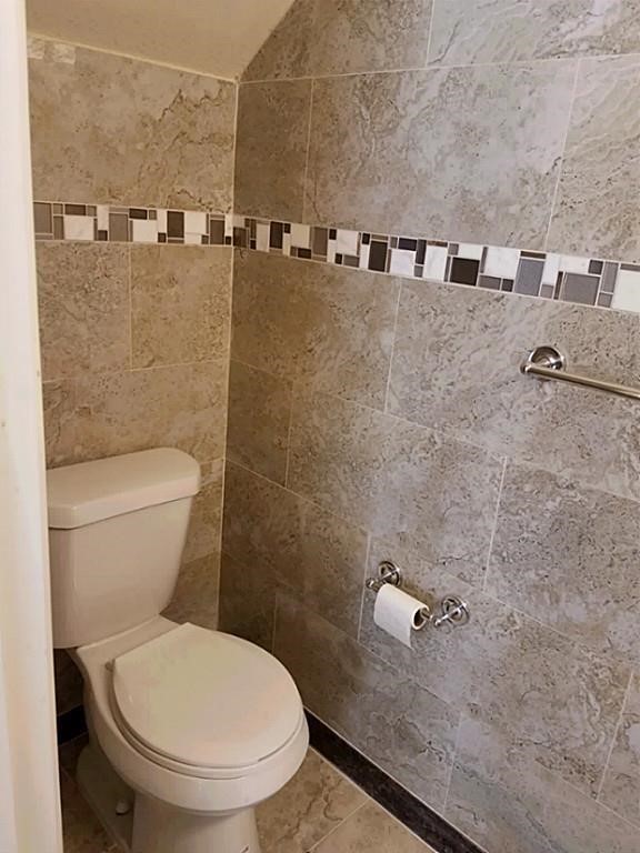 31 Verbena Bend Place Spring, TX 77382 - Photo 5 of 13 a bathroom with a toilet and a sink