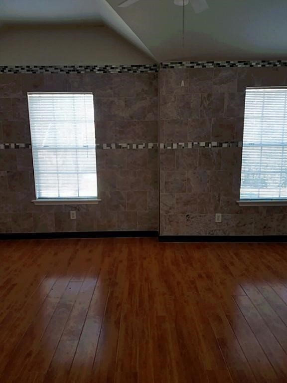 31 Verbena Bend Place Spring, TX 77382 - Photo 9 of 13 a view of a bathroom with wooden floor and a window