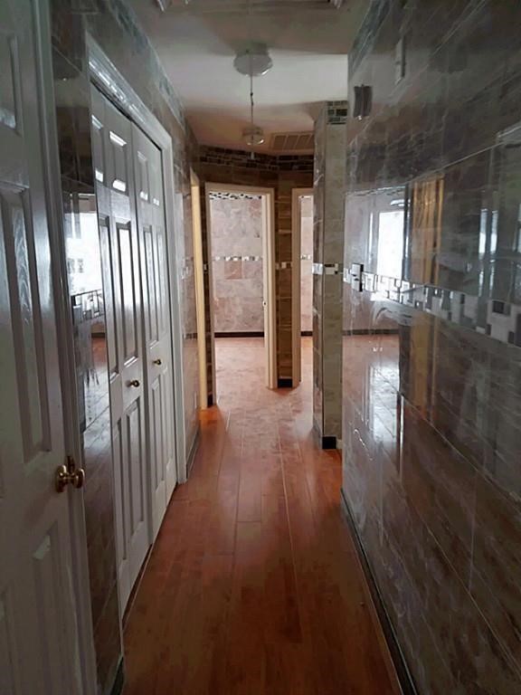 31 Verbena Bend Place Spring, TX 77382 - Photo 10 of 13 a view of gallery with wooden floor