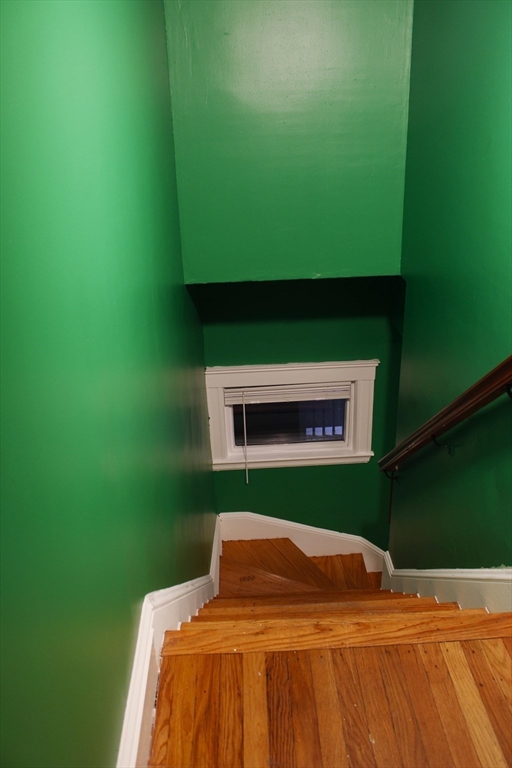 45-47 Coolidge Road, Unit 2 Boston, MA 02134 - Photo 2 of 11 a backyard of a house with lots of green space