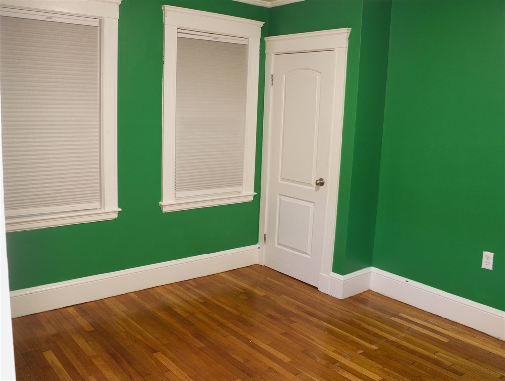 45-47 Coolidge Road, Unit 2 Boston, MA 02134 - Photo 9 of 11 a view of outdoor space and wooden floor