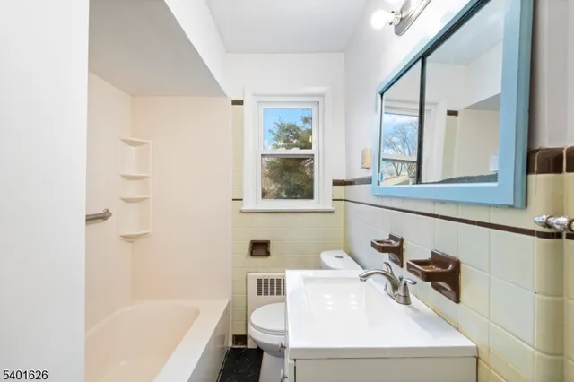 a view of empty room with wooden ceiling