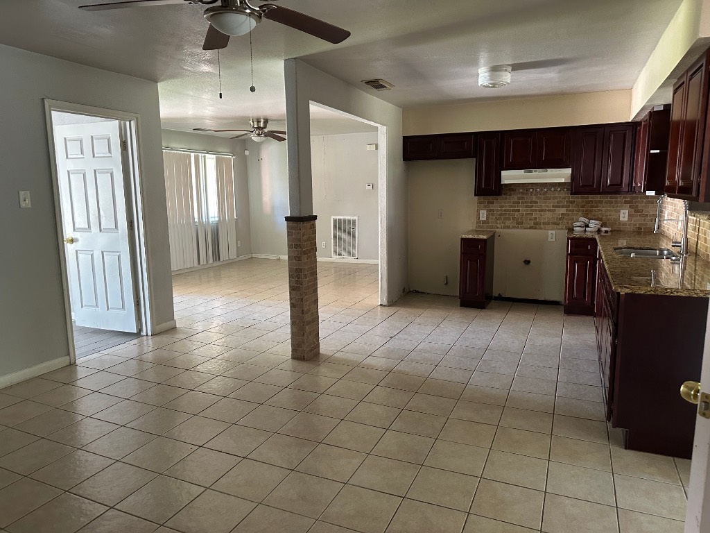 930 South Utah Street La Porte, TX 77571 - Photo 2 of 8 a view of a kitchen with a sink and cabinets