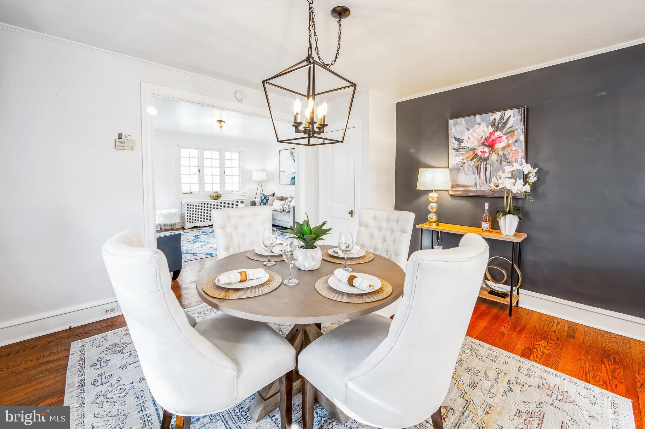 2423 Avon Road Ardmore, PA 19003 - Photo 13 of 37 a view of a dining room with furniture and wooden floor