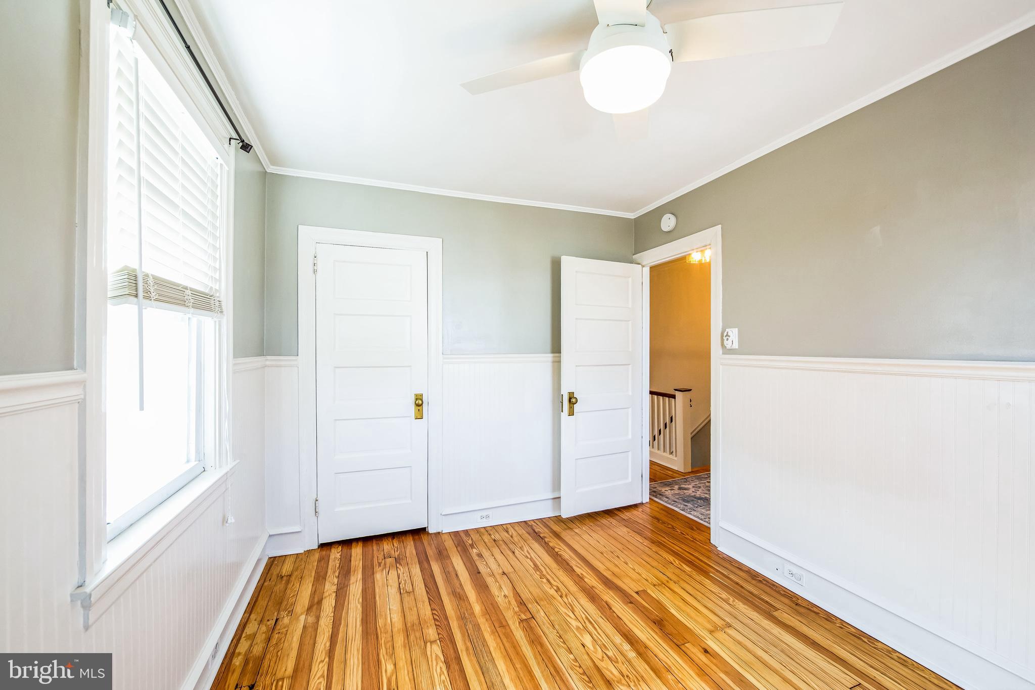 2423 Avon Road Ardmore, PA 19003 - Photo 25 of 37 a view of empty room with wooden floor and fan