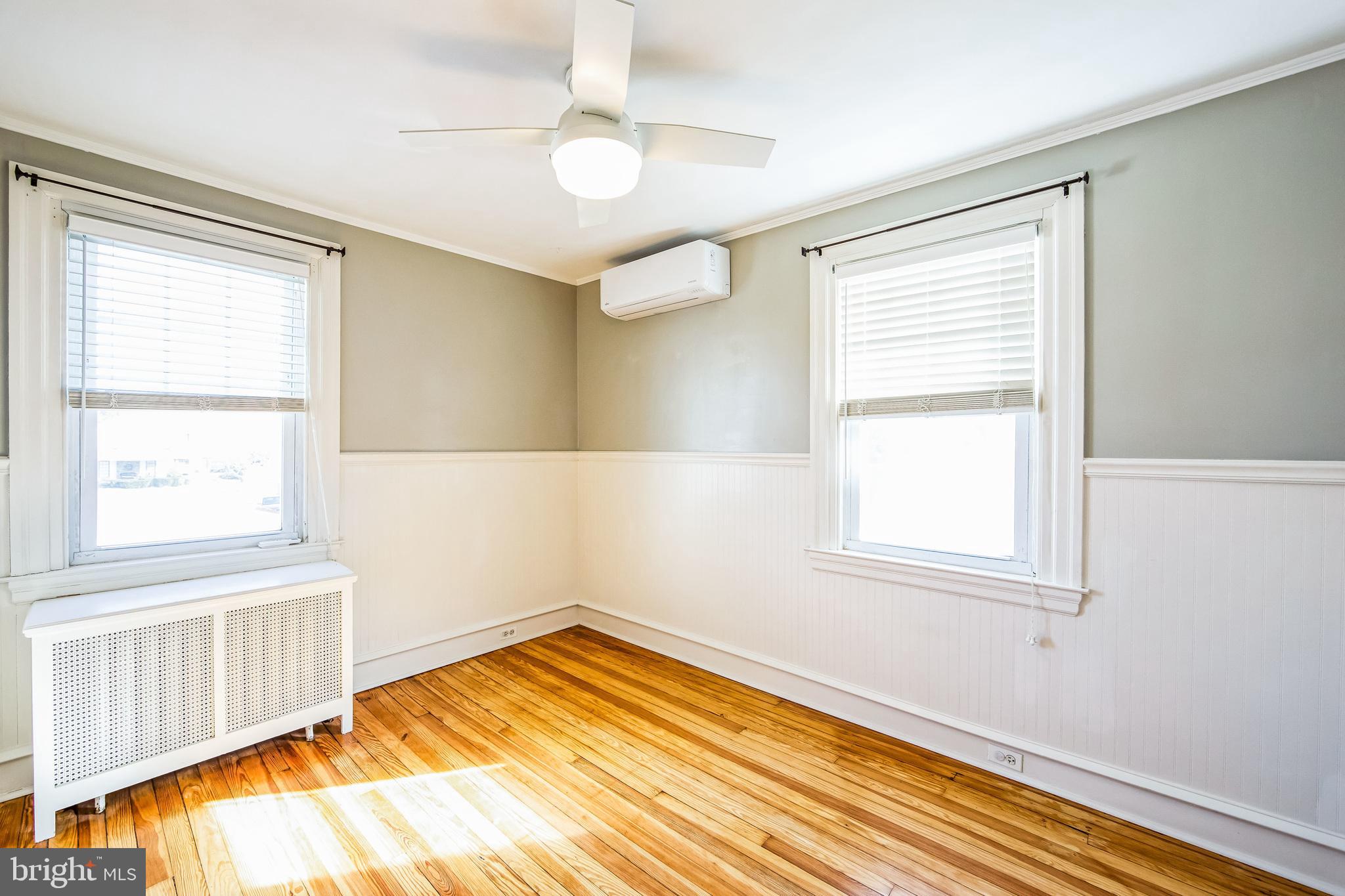 2423 Avon Road Ardmore, PA 19003 - Photo 26 of 37 a view of an empty room with wooden floor and a window