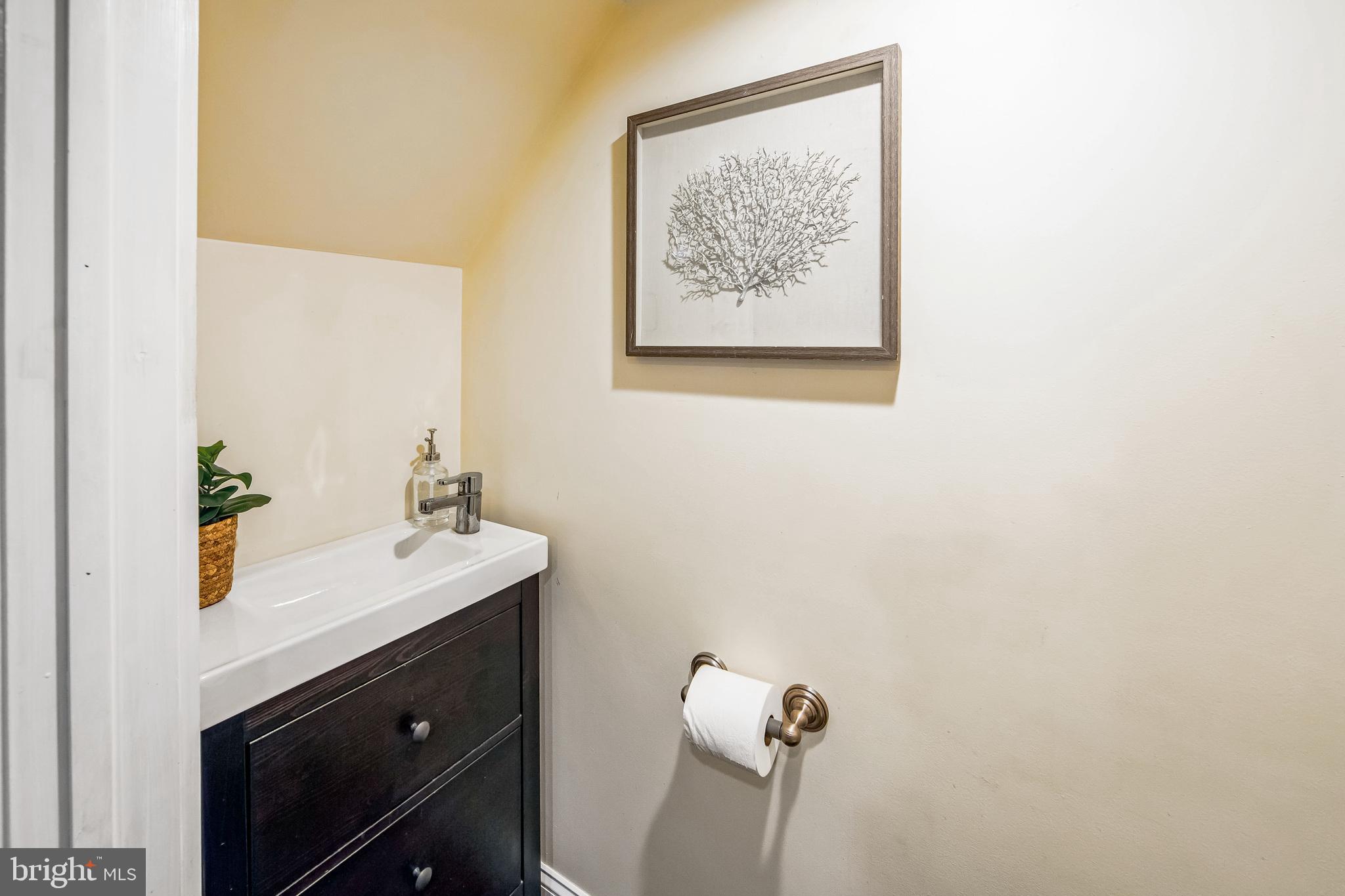 2423 Avon Road Ardmore, PA 19003 - Photo 34 of 37 a bathroom with a sink and a mirror