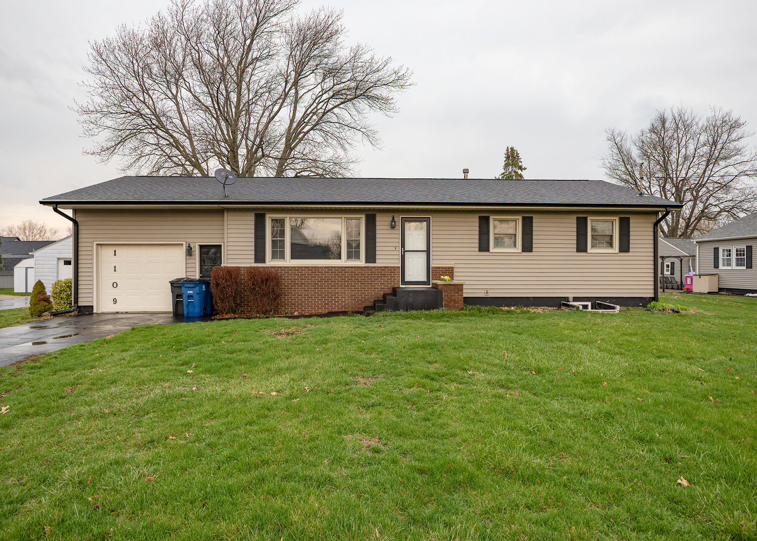 1109 14th Avenue Orion, IL 61273 - Photo 1 of 37 a front view of house with yard and green space
