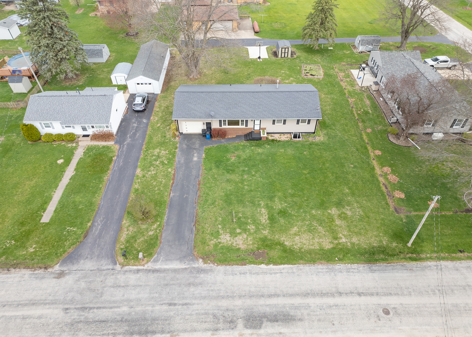 1109 14th Avenue Orion, IL 61273 - Photo 33 of 37 an aerial view of a house with garden space and street view