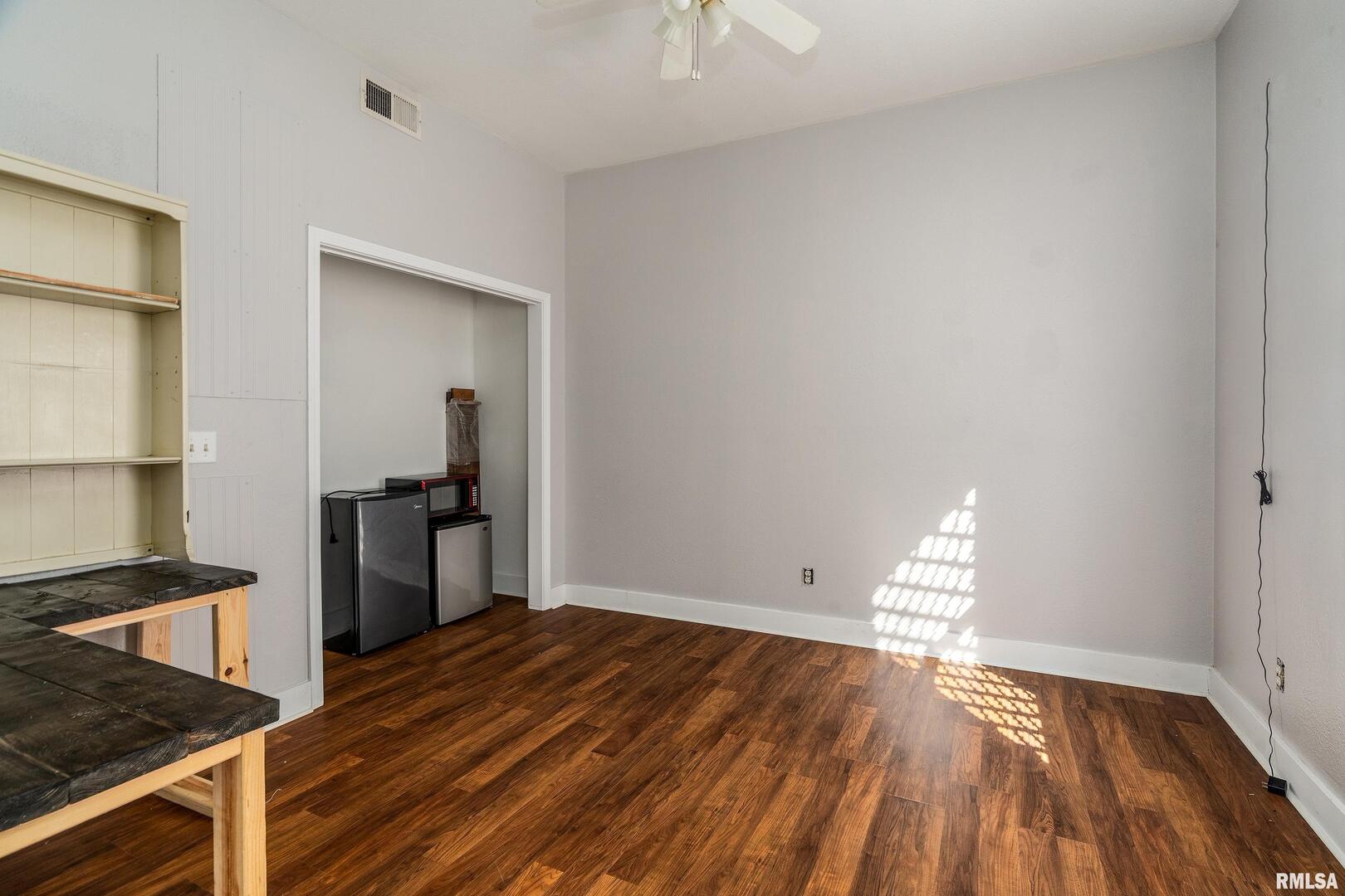 609 South Poplar Street Carbondale, IL 62901 - Photo 15 of 44 a view of a kitchen from the hallway
