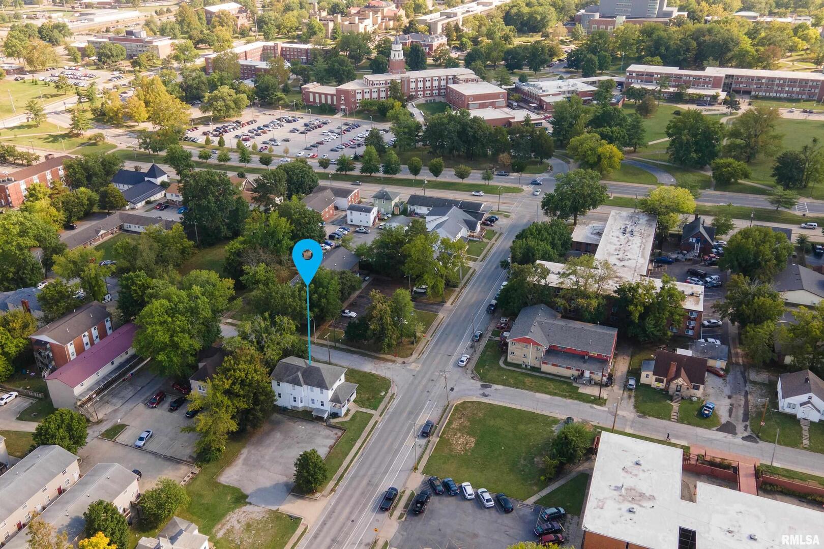 609 South Poplar Street Carbondale, IL 62901 - Photo 4 of 44 an aerial view of residential houses with outdoor space