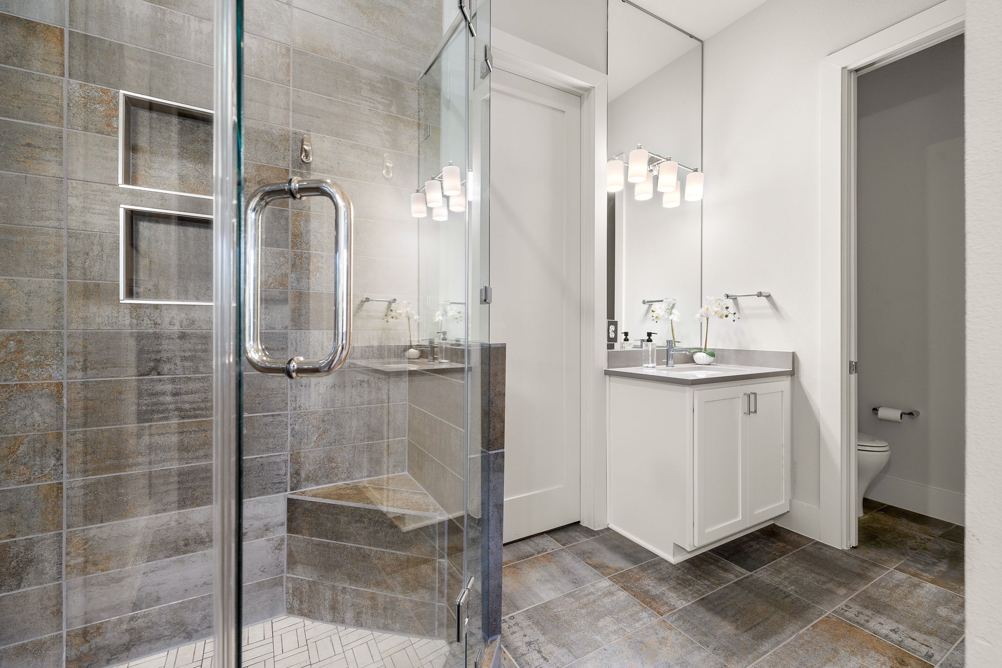 5214 Pink Poppy Pass Austin, TX 78735 - Photo 18 of 34 Full bathroom featuring vanity and a shower stall