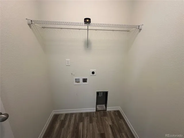 a bathroom with a granite countertop sink a toilet and bathtub