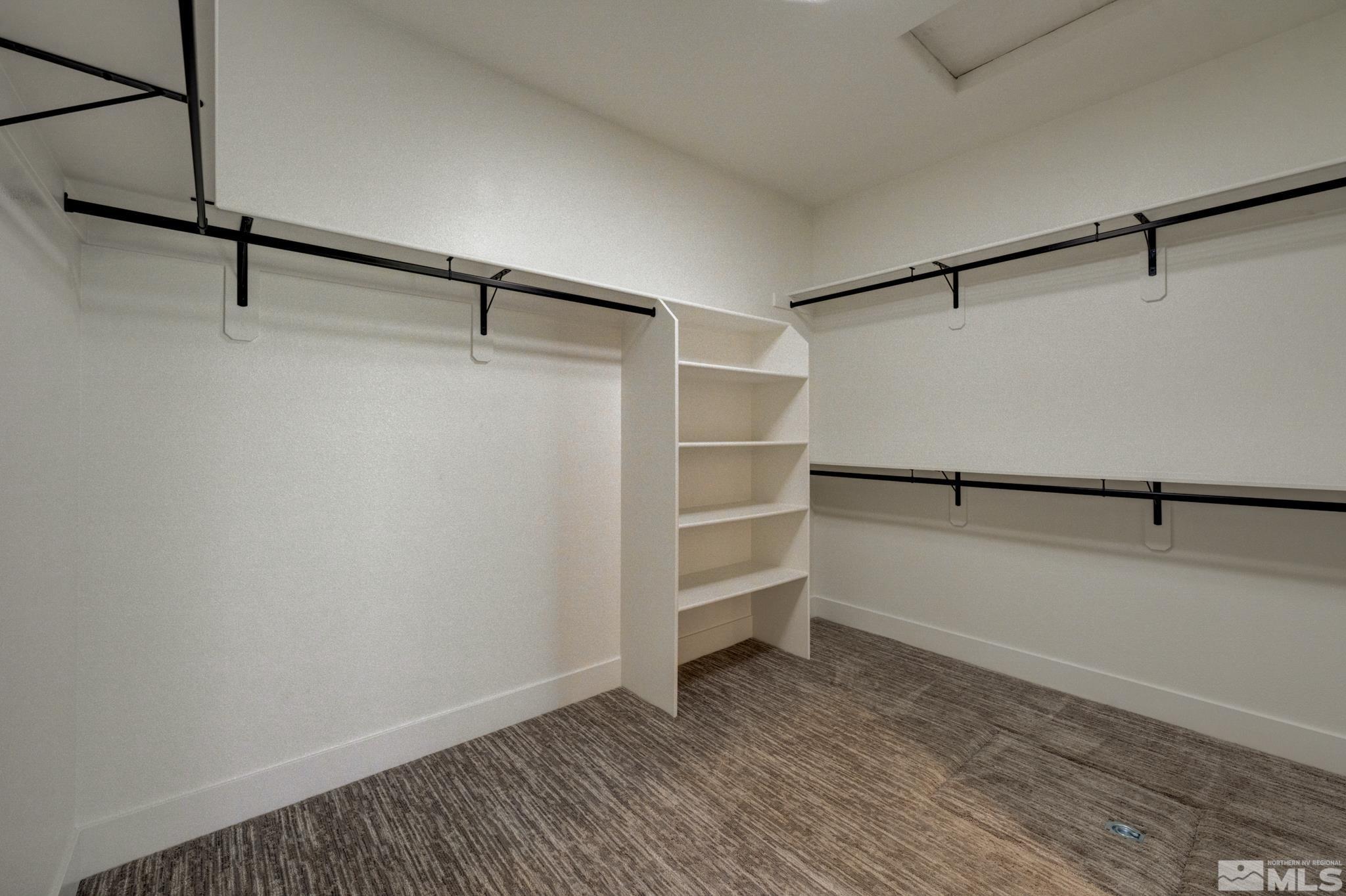 1095 Flanders Road Reno, NV 89511 - Photo 20 of 39 a view of walk in closet with empty racks