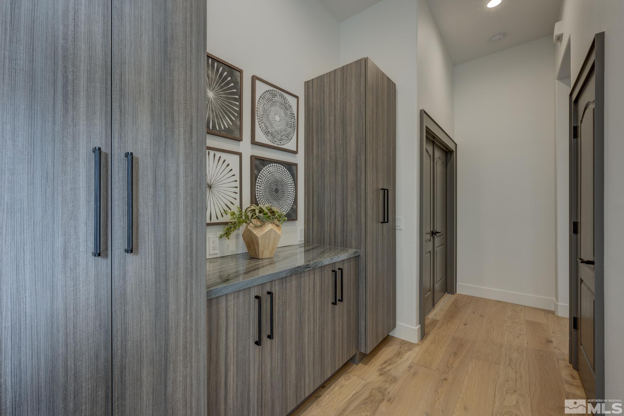 1095 Flanders Road Reno, NV 89511 - Photo 21 of 39 a view of hallway with wooden floor