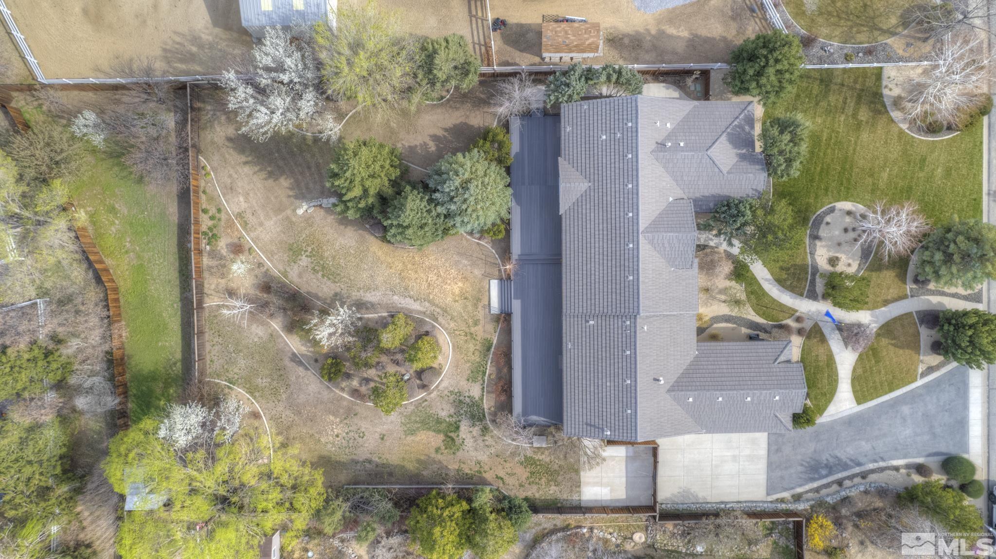 1095 Flanders Road Reno, NV 89511 - Photo 34 of 39 an aerial view of residential houses with outdoor space