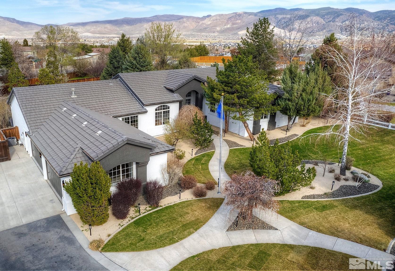 1095 Flanders Road Reno, NV 89511 - Photo 4 of 39 an aerial view of a house with a yard