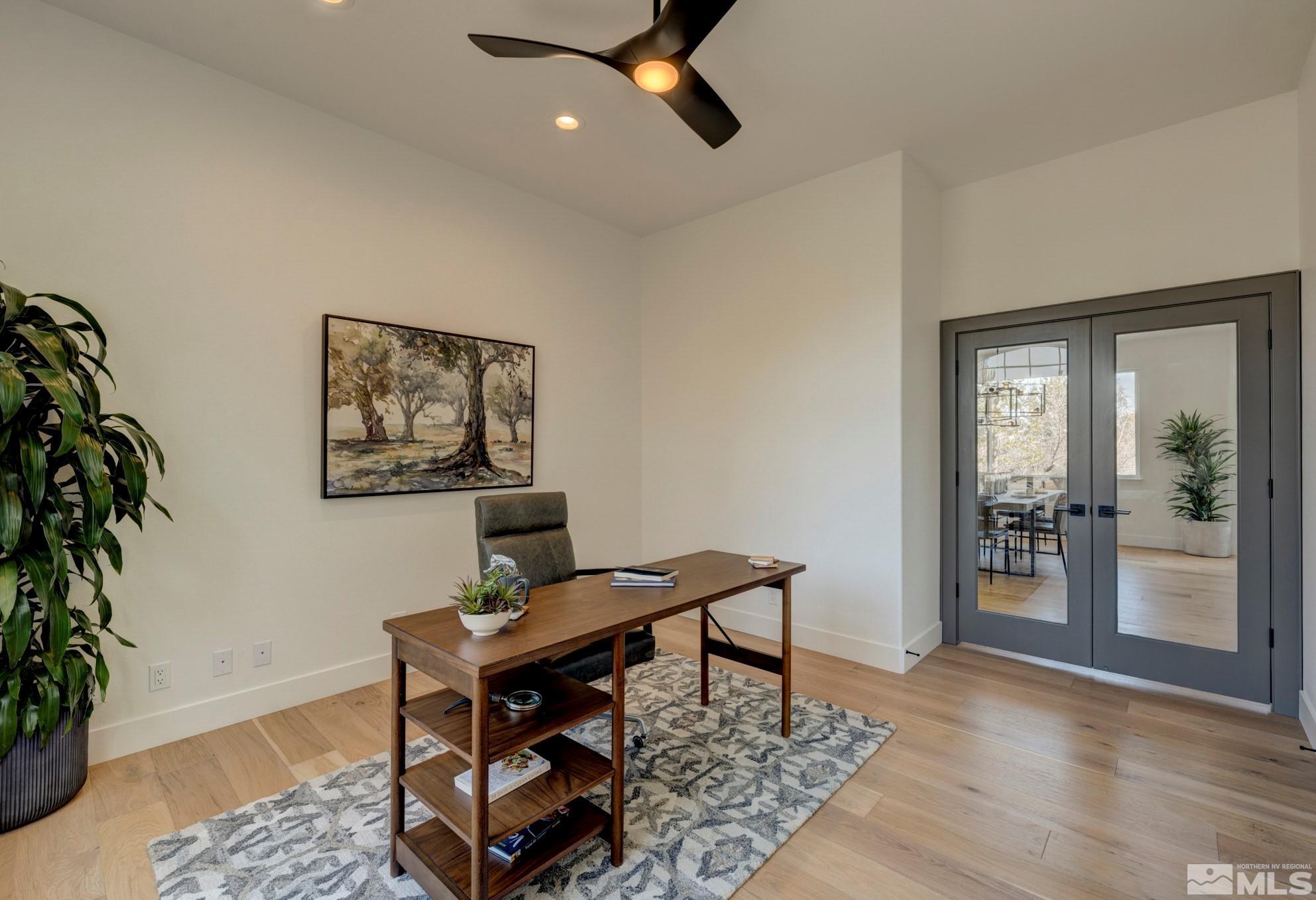 1095 Flanders Road Reno, NV 89511 - Photo 8 of 39 a workspace with furniture and window