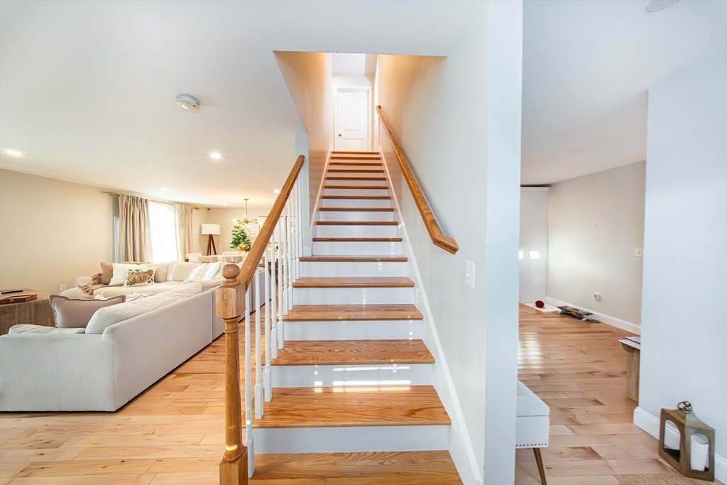 27 Vista Way Fall River, MA 02724 - Photo 19 of 33 a view of entryway and hall with wooden floor