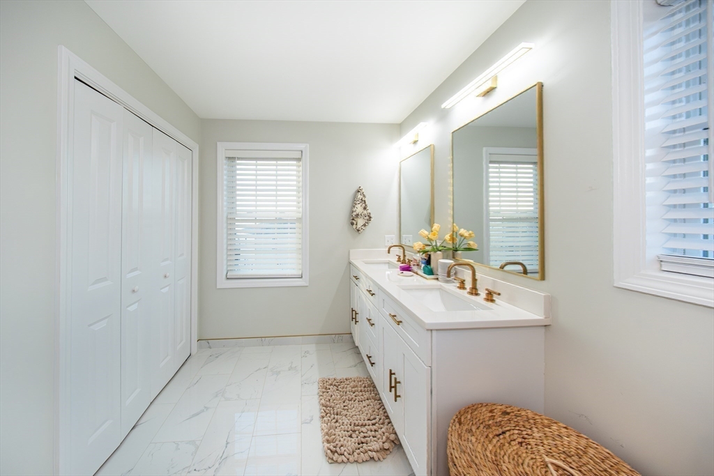 27 Vista Way Fall River, MA 02724 - Photo 28 of 33 a utility room with cabinets washer and dryer