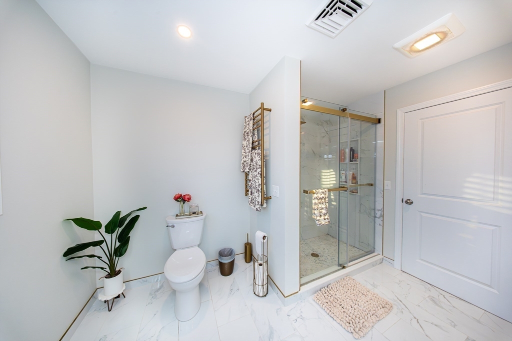 27 Vista Way Fall River, MA 02724 - Photo 29 of 33 a bathroom with a shower sink and toilet