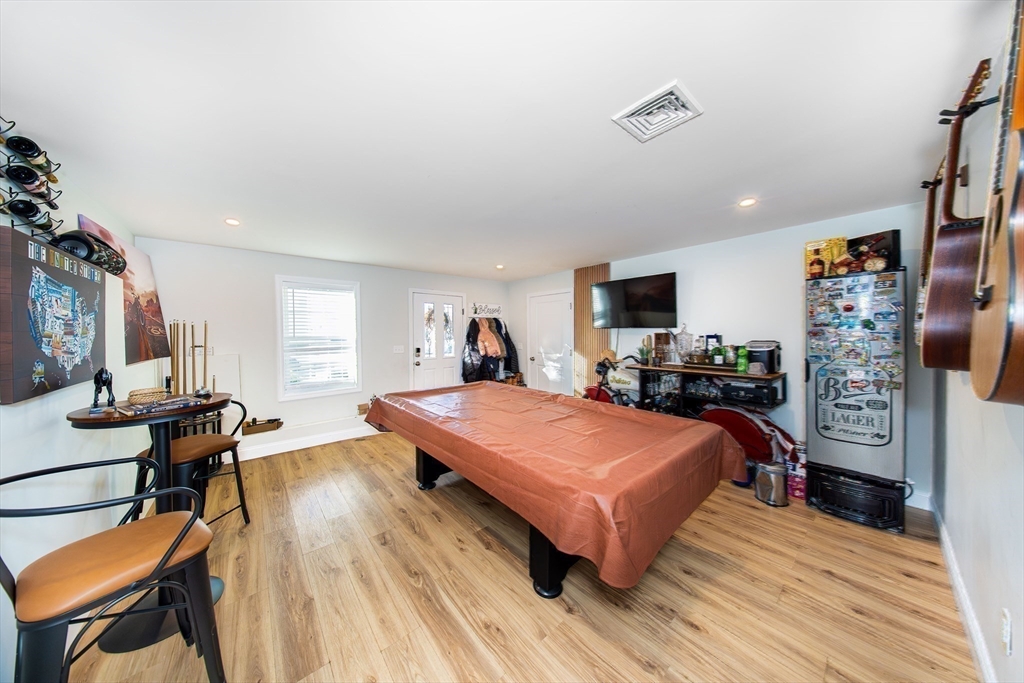 27 Vista Way Fall River, MA 02724 - Photo 32 of 33 a room with furniture a flat screen tv and a table