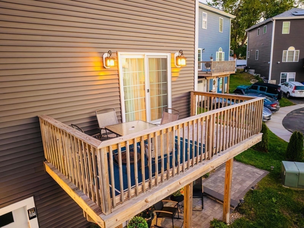 27 Vista Way Fall River, MA 02724 - Photo 8 of 33 a view of a deck with furniture