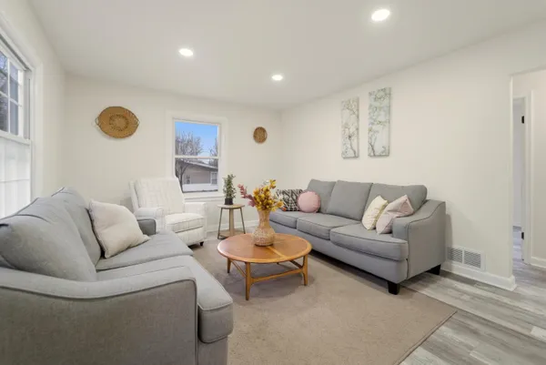a living room with furniture and a couch