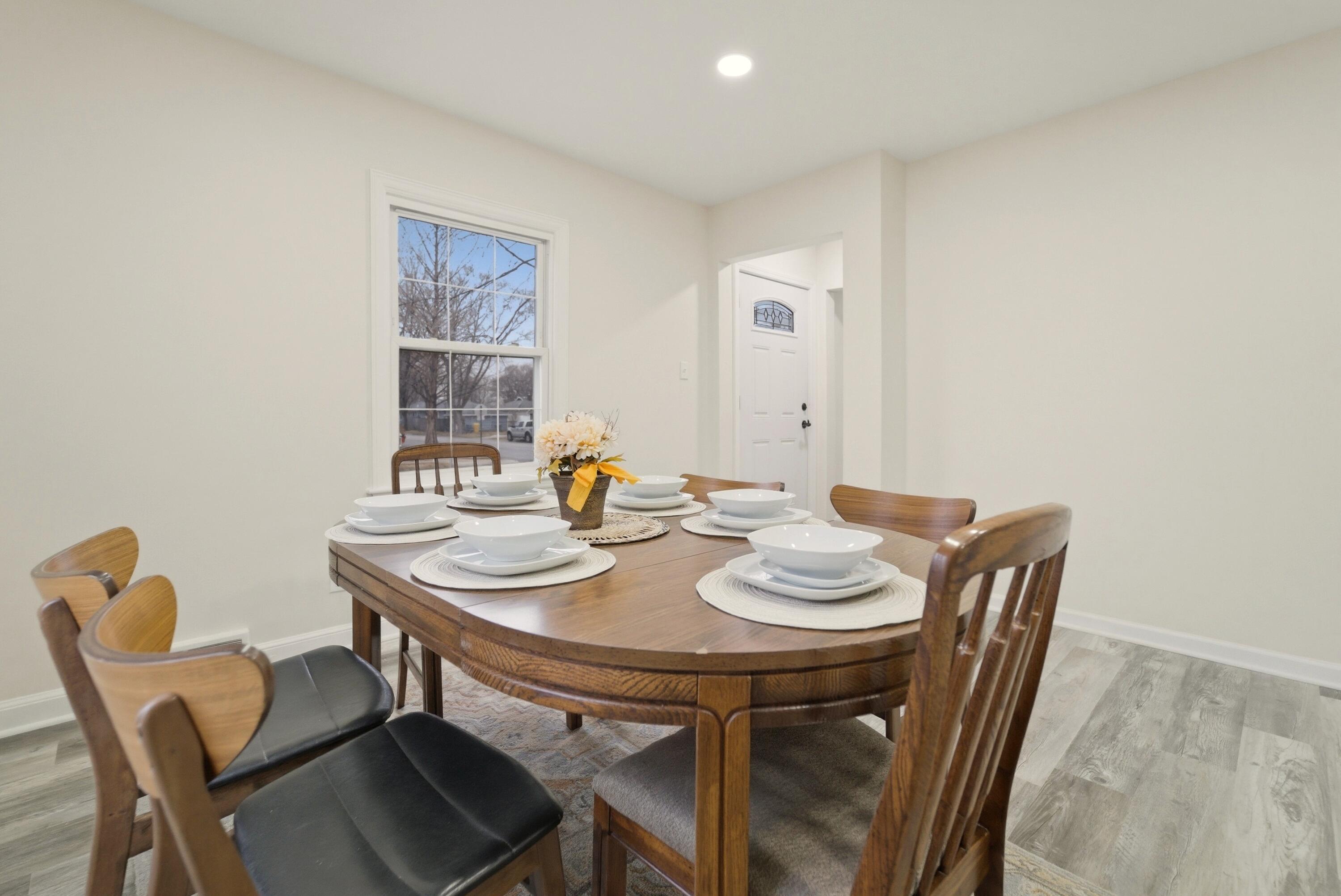 747 North Lafayette Street Griffith, IN 46319 - Photo 6 of 31 a view of a dining room with furniture and wooden floor