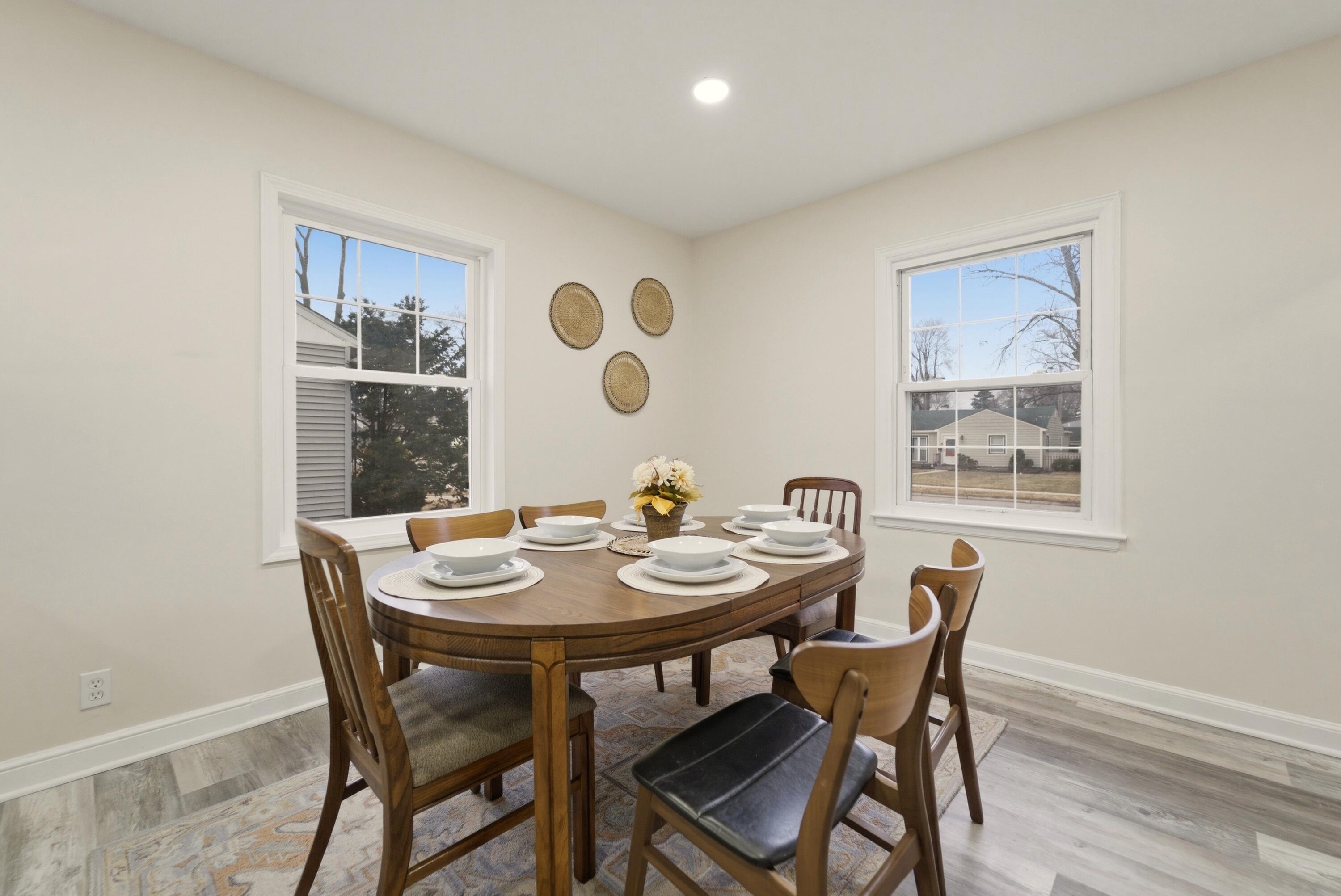 747 North Lafayette Street Griffith, IN 46319 - Photo 7 of 31 a view of a dining room with furniture and wooden floor
