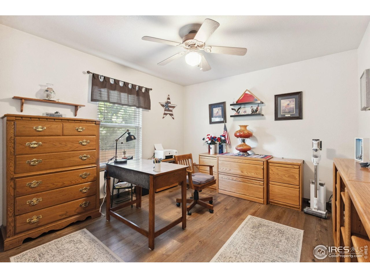 2131 68th Avenue Greeley, CO 80634 - Photo 14 of 39 a workspace with furniture