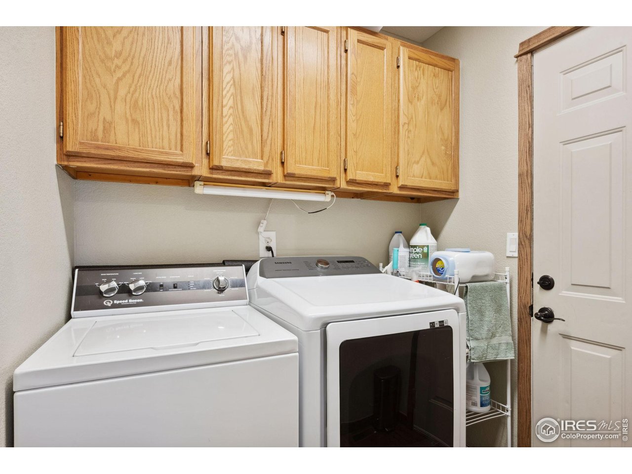 2131 68th Avenue Greeley, CO 80634 - Photo 18 of 39 a utility room with dryer and washer