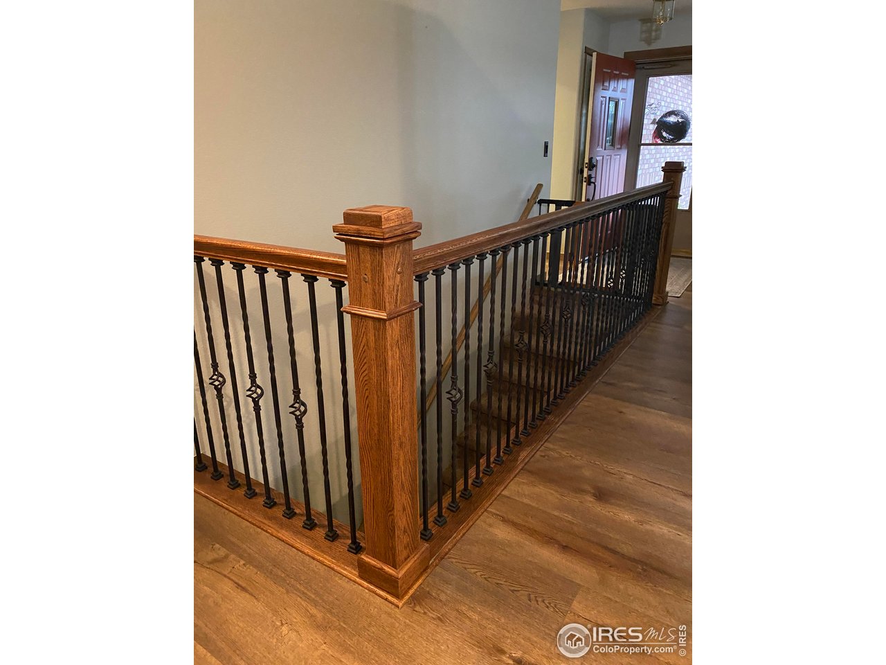 2131 68th Avenue Greeley, CO 80634 - Photo 19 of 39 a view of a hallway with stairs