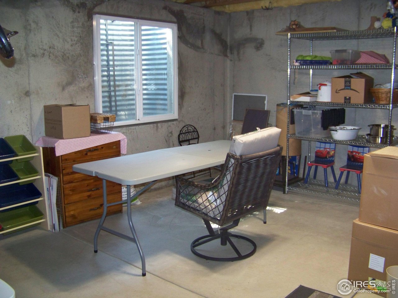 2131 68th Avenue Greeley, CO 80634 - Photo 22 of 39 a view of a dining room with furniture