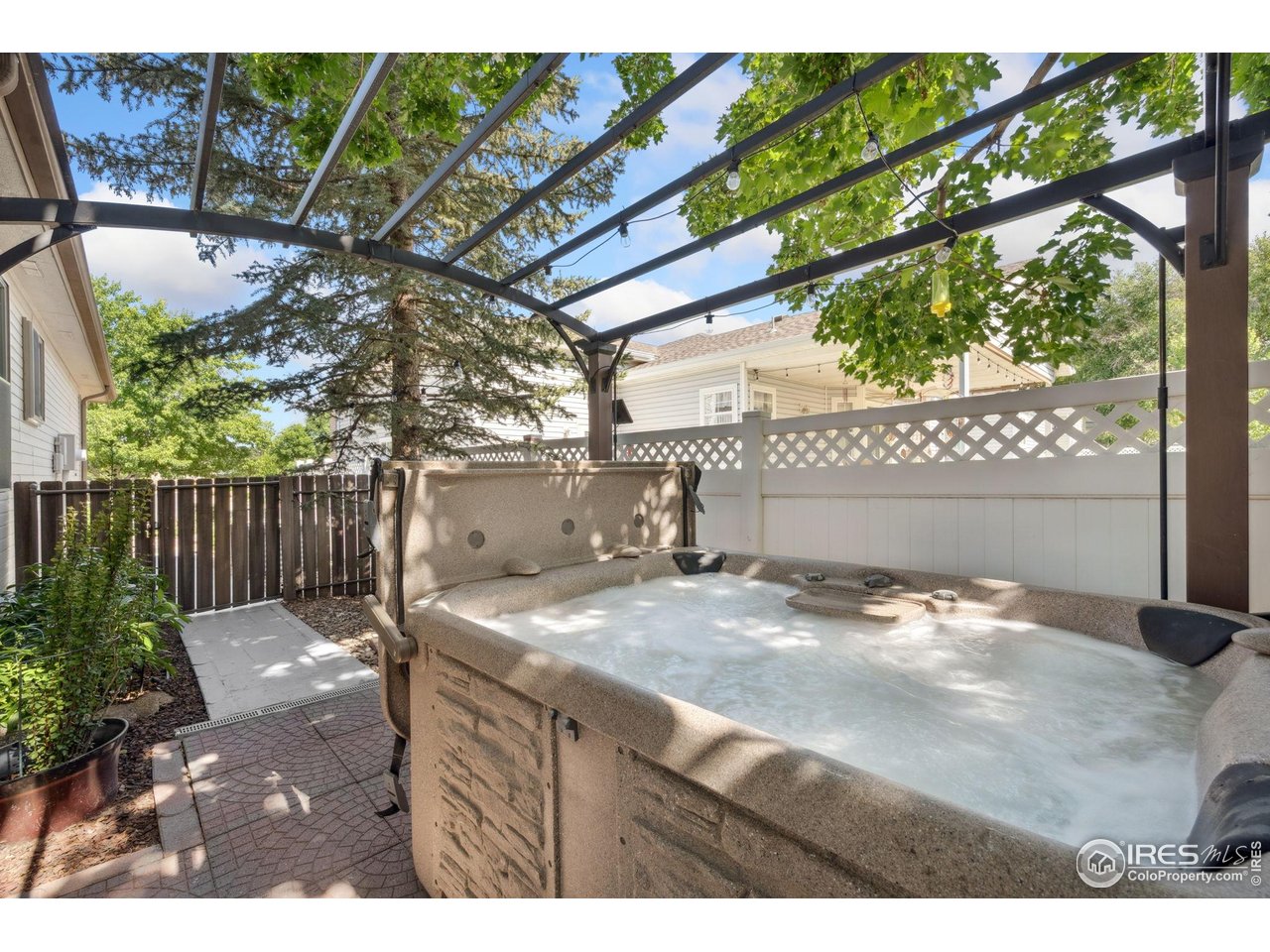 2131 68th Avenue Greeley, CO 80634 - Photo 29 of 39 a view of a backyard with wooden fence