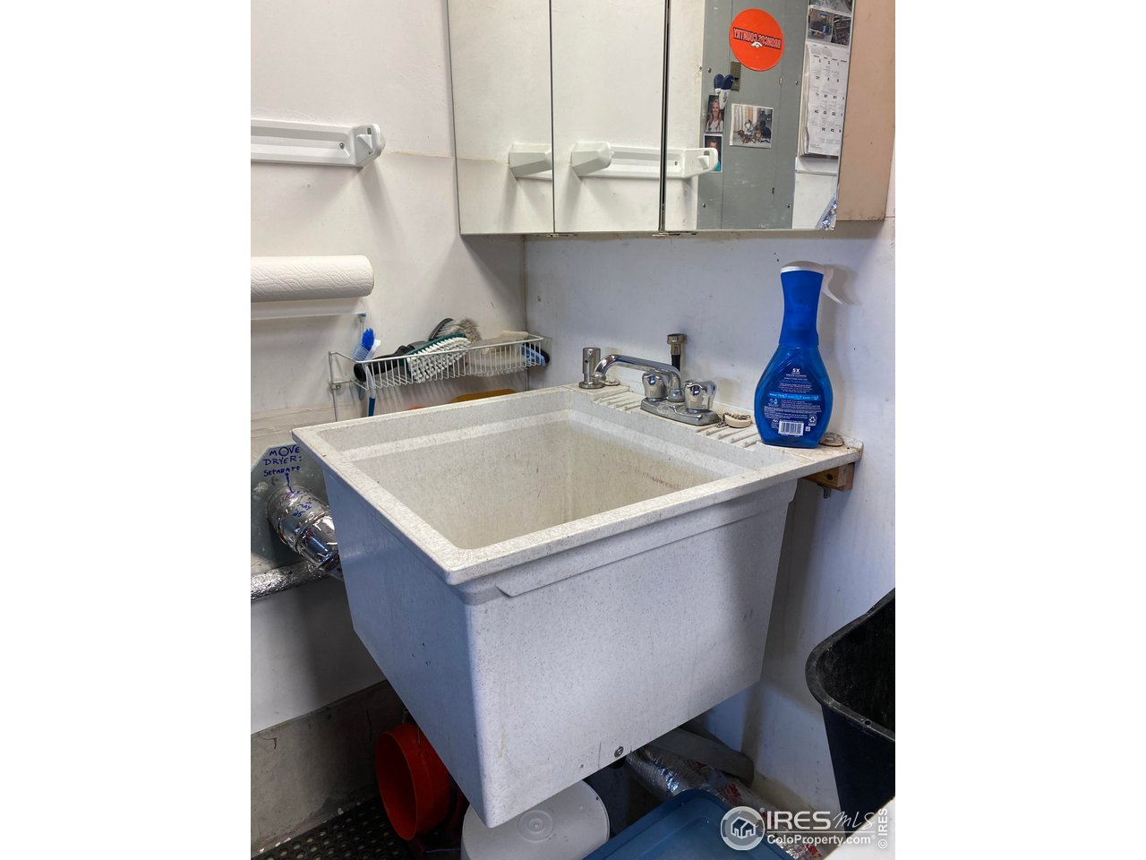 2131 68th Avenue Greeley, CO 80634 - Photo 32 of 39 a utility room with dryer and washer